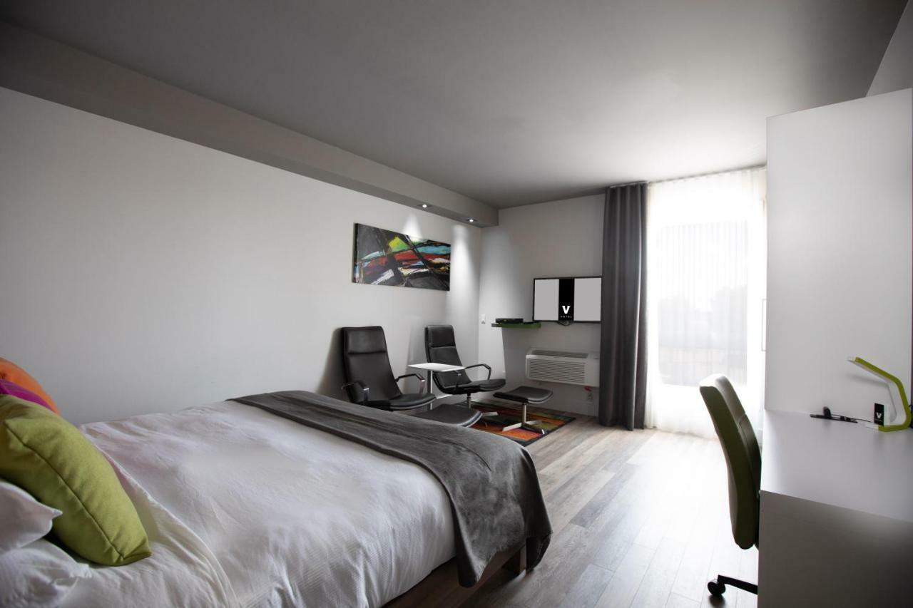Chambre Urbaine avec 1 Lit King-Size et 1 Lit Escamotable